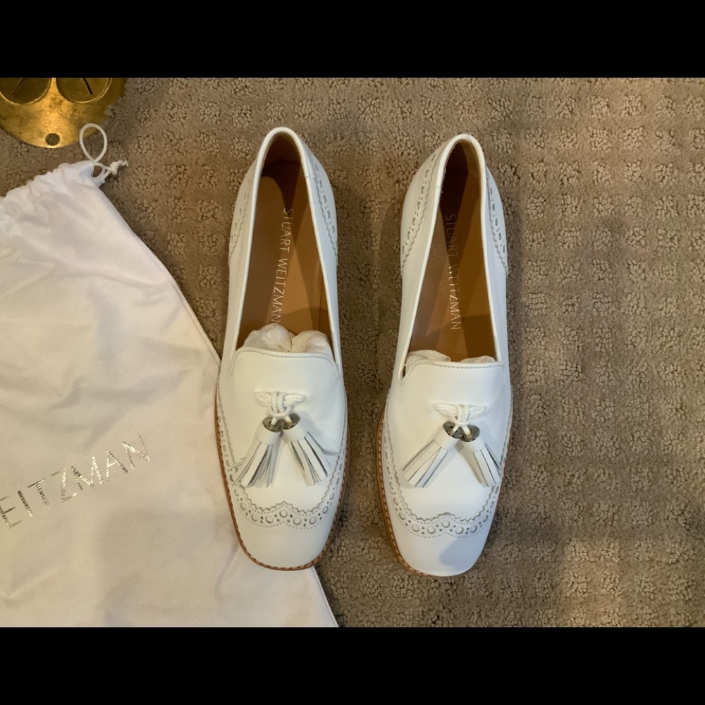 NWOT Stuart Weitzman white leather loafers.